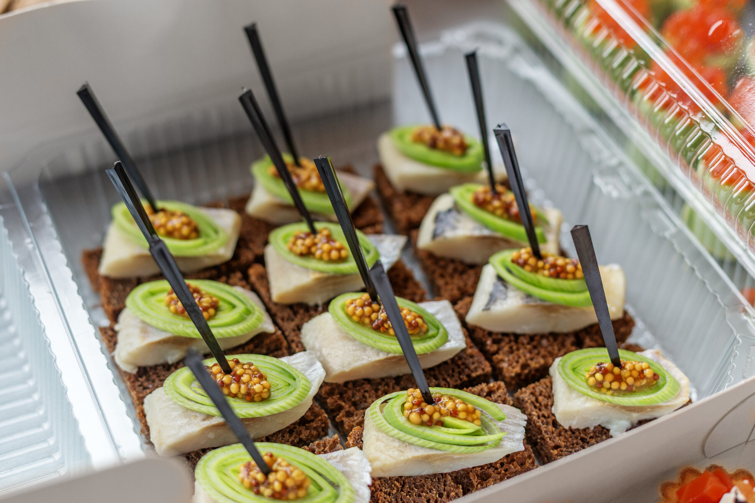 Plated dishes being served at a private dinner event on Koh Samui